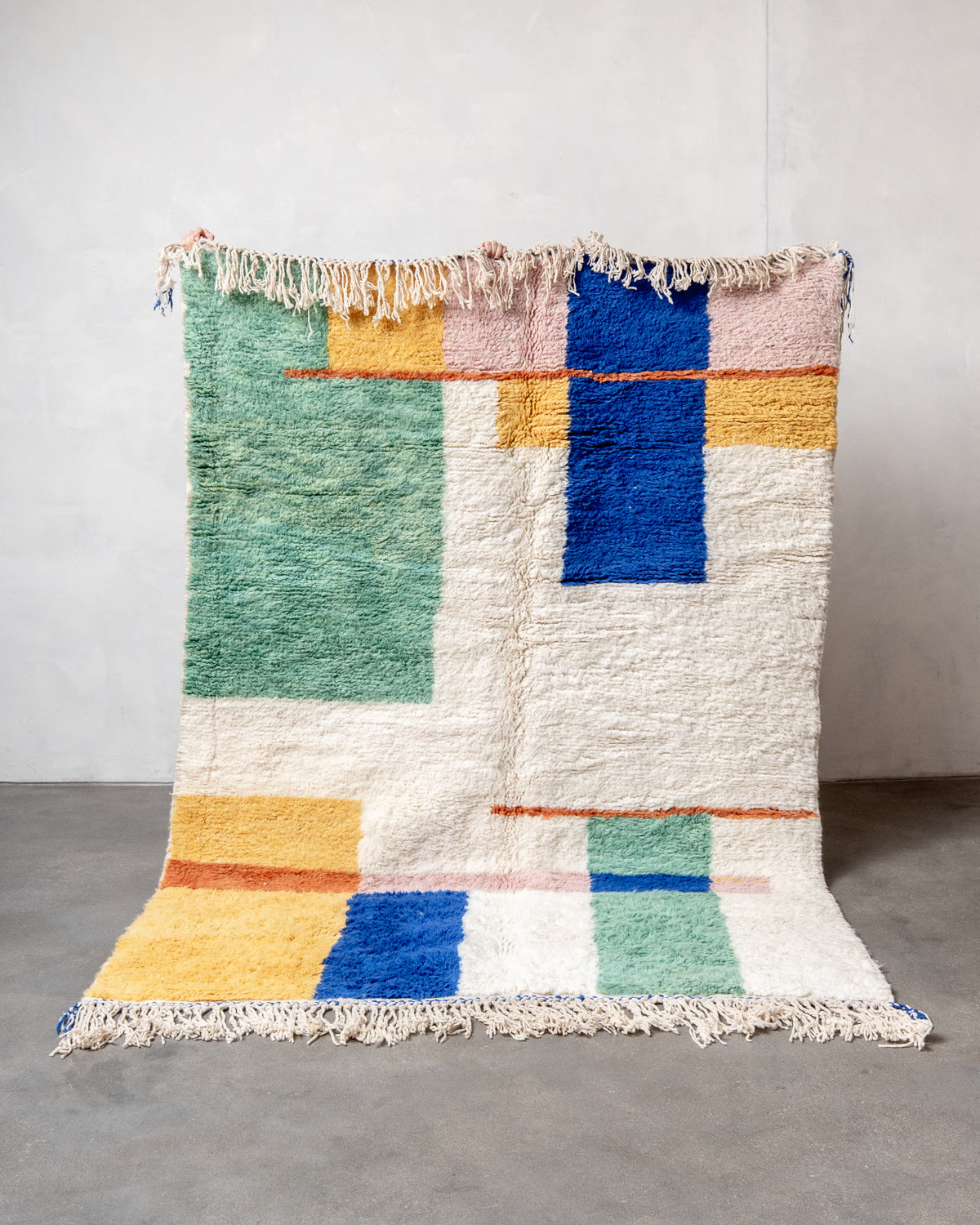 Modern, designer, handcrafted Berber rug from Morocco. Beniourain carpet with beautiful colours and patterns and fluffy wool texture.